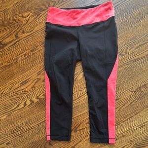 Athleta Splits Revelation Capri, heather Day-glo orange & black. Small.